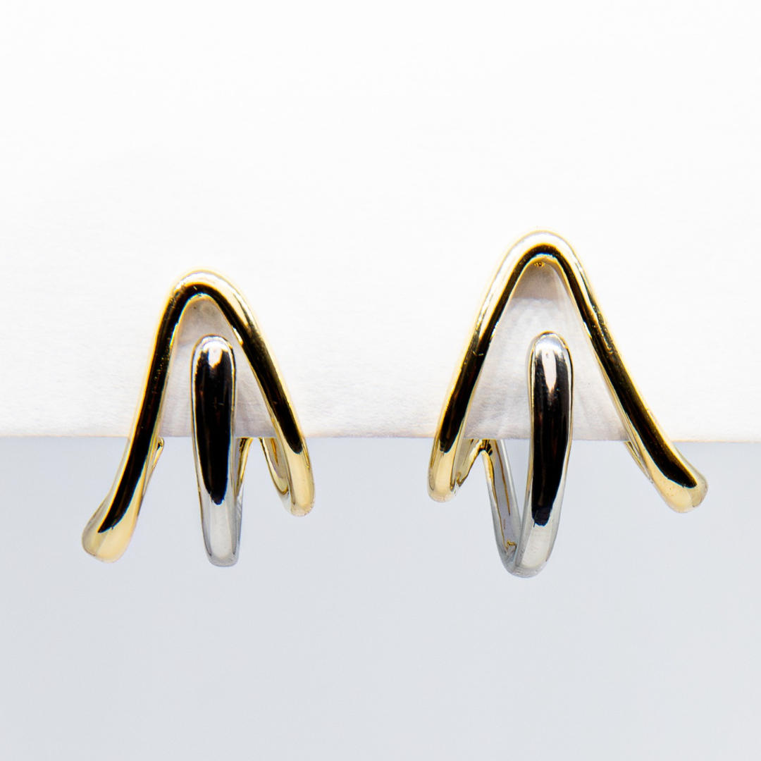 Daring Maverick gold and silver earrings