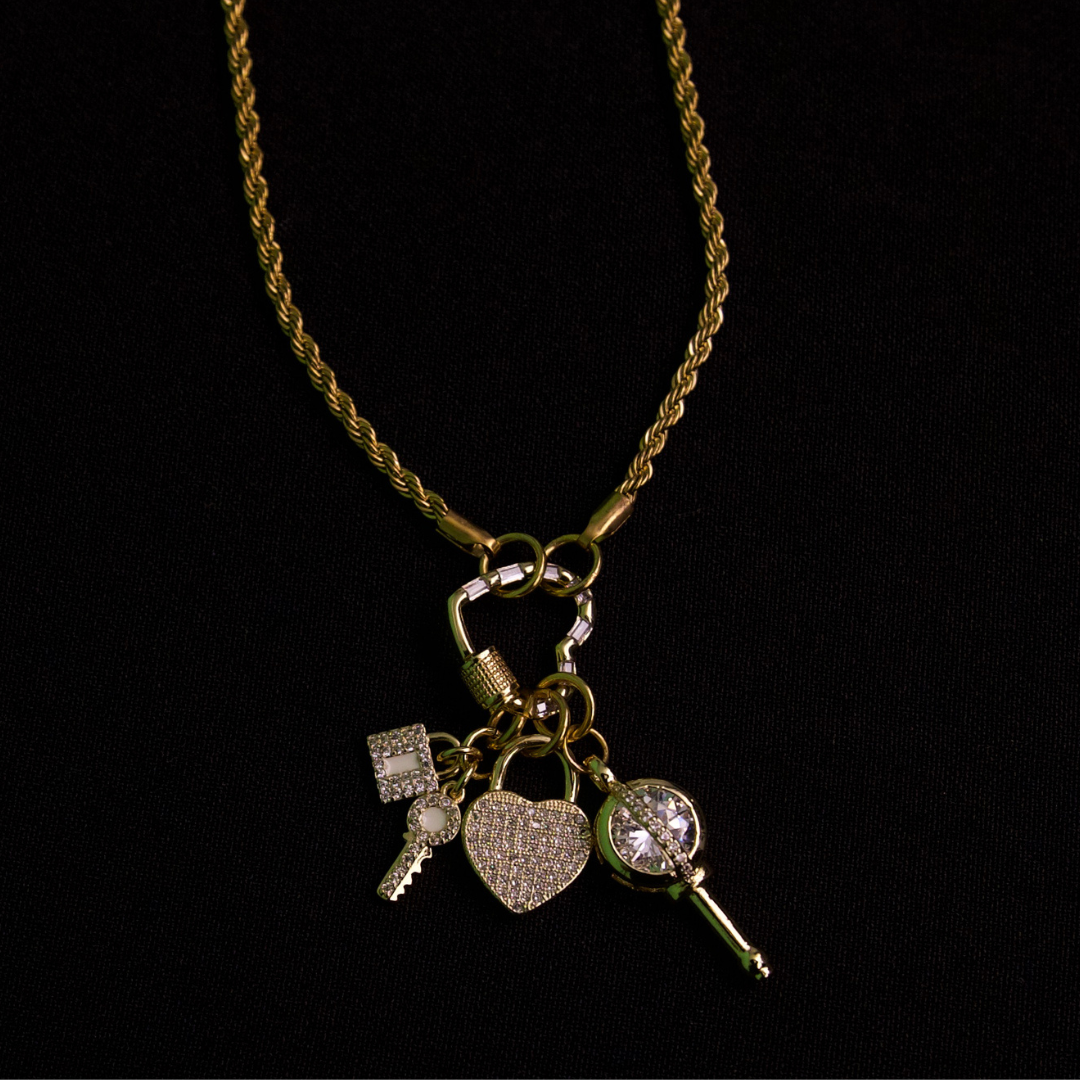 Love’s Key gold charms and gold rope chain necklace