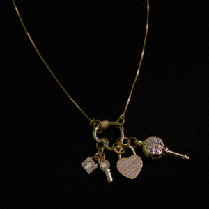 Love’s Key gold charms and gold cable chain necklace
