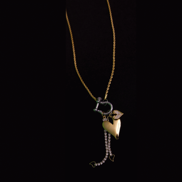 Radiant heart gold and silver charms and gold rope chain necklace