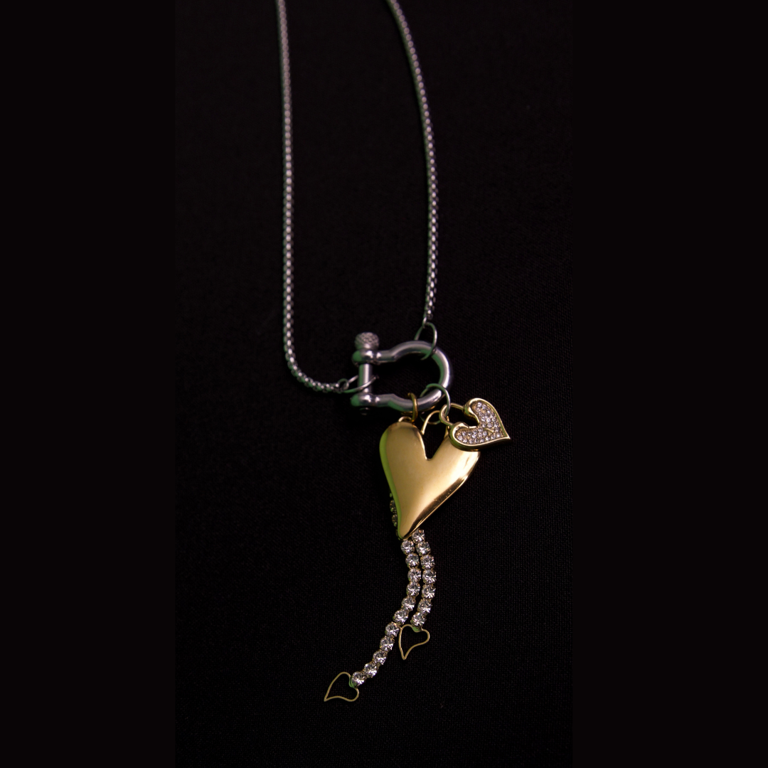 Radiant heart gold and silver charms and silver box chain necklace